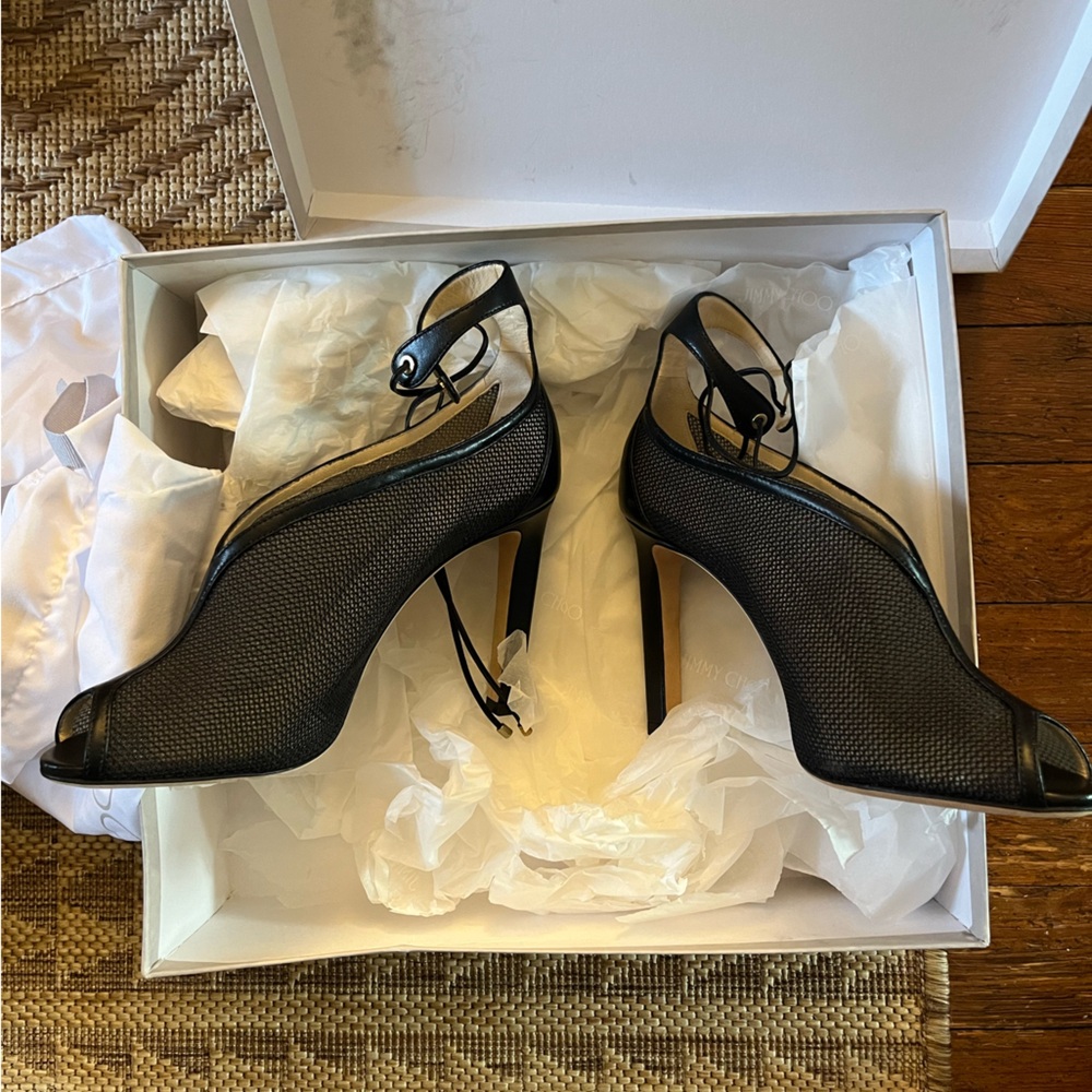 Brand new, never worn, jimmy choo.  Sayra pumps.  37